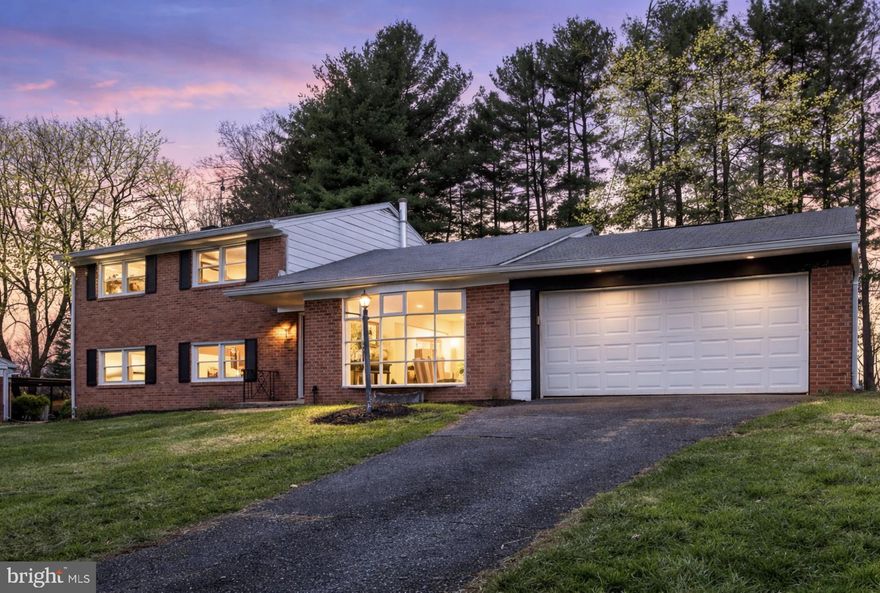 Nestled on nearly half an acre in the sought-after Sherwood Forest neighborhood of Silver Spring, this thoughtfully updated home offers a rare combination of privacy, space, and modern upgrades surrounded by nature. Set on a peaceful, tree-lined street, the property is regularly visited by local wildlife, including deer and foxes, creating a setting that feels like a quiet retreat while still being minutes from everyday conveniences.

The home has been fully renovated across four finished levels, blending classic charm with beautiful modern upgrades. The kitchen features quartz countertops, new custom cabinetry, and stainless steel appliances, opening into bright and inviting living spaces. A spacious family room anchored by a wood-burning fireplace creates the perfect place to gather and unwind.

Upstairs, the primary bedroom includes a private ensuite bath, while two additional bedrooms share a full hall bathroom. The multiple finished levels provide excellent flexibility for modern living, including a lower-level den that can serve as a guest room, home office, or additional living space.

Recent upgrades include a new HVAC system and hot water heater, offering comfort and efficiency for years to come. Outside, a patio provides the perfect setting to enjoy the mature trees, peaceful surroundings, and frequent wildlife sightings.

With its classic brick front, two-car garage, generous lot, and quick access to shopping, dining, commuter routes, and parks, this home offers the rare feeling of a private oasis while remaining close to everything Silver Spring has to offer.