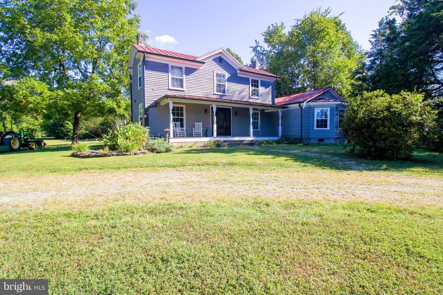 Modern Farm house meets 25 acres of prime land. Ready to bring your belongings and farm animal friends. This quiet and quant home is boasting with character with the modern day essentials. Front porch is built to last with composite decking and over looking undeveloped land and a small pond. Ensure all your friends and family will have a parking space with the enormous horse shoe shaped driveway. Enough land to spread out for any and all outdoor activities. Separate fenced in area to let your fur animals have their own space. Bonfires on a cool evening will be sure to create memories while relaxing and story telling. Screened in back porch for any unexpected weather to relax and enjoy your warm beverage on those cool autumn mornings. Main level master bedroom with beautiful master bathroom and closet space, right off of the kitchen. Access to laundry room right next to the master bedroom. Upstairs you will find 2 bedrooms and one full bathroom perfect for a growing family. End your day together by cuddling up in the addition with high ceilings and wood burning fire place. This property is a must see and you can truly make it your own.