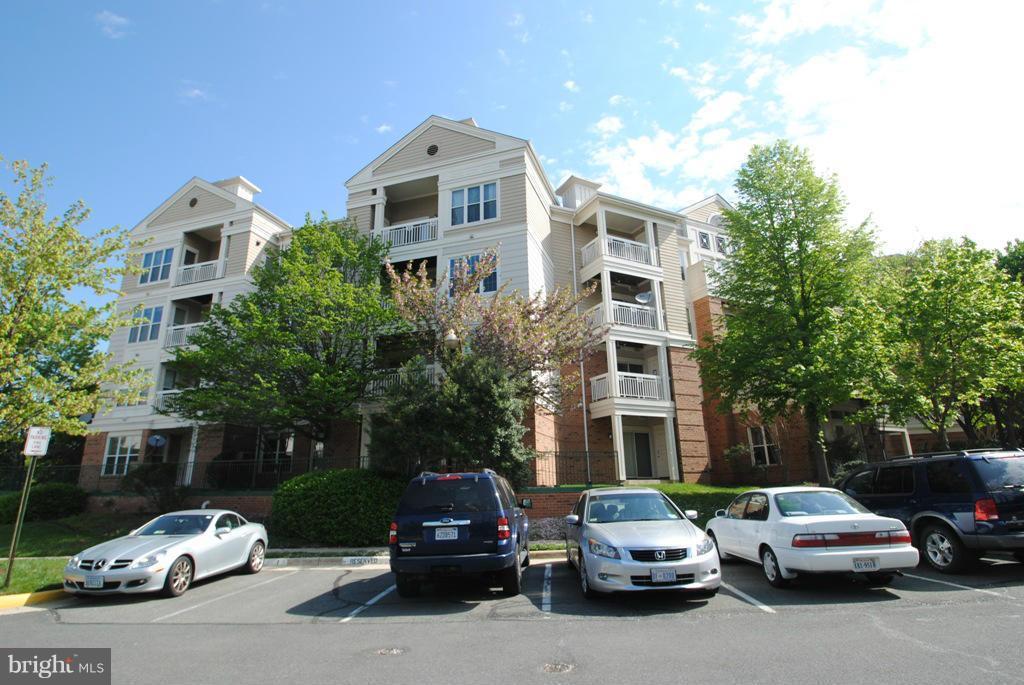 Wonderful 2 BR, 2 BA unit with beautiful wood floor. Open floor plan with GRANITE COUNTERS and Stainless Steel appliances in kitchen. Great Balcony view. Building adjacent to community building with gym and pool. Walk to shops, restaurants, and movie theaters. One reserved garage parking plus two additional permit parking spaces.