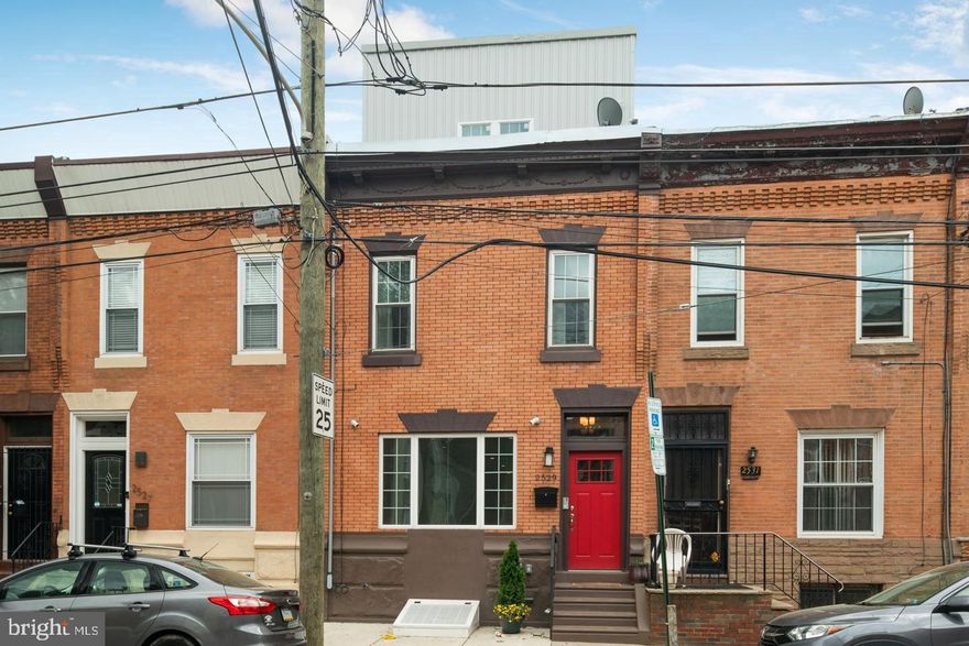2529 Grays Ferry Ave is the stunning renovation you've been searching for in Graduate Hospital. It is located on a quiet block across from Naval Square and surrounded by new homes, As you walk out, you will see the trees lining the road with the city skyline at the end. This home is not your average builder grade renovation. The owners have gutted and designed every inch of this home. Enter in your private, tiled vestibule to dry off on a rainy day. Through the glass door, you will walk in to a massive living area with plenty of room for oversized furniture. The dining and chef's kitchen with 36" six burner range and Wolf appliances also make up this level alongside a tucked away powder room. The kitchen has loads of storage on both sides and will inspire the inner cook in you. Head upstairs and you'll see two very generous sized rooms with great closet space. One bedroom has an attached shower while the other large bathroom is off the hallway. Uniquely designed on this level is a great laundry room as well as a tucked away den perfect for a small in-home office. The owners suite is comprised of the entire third floor. This bedroom includes one of the largest walk in closets you will see in this price range and is completely outfitted by the Container Store. The owners suite bathroom exudes luxury with a double vanity and a large shower with rain head and bench. Lastly, one more level will get you to the large roof deck with completely unobstructed views of the city. The home also features a large finished basement, where you will find the 4th bedroom. Schedule your showing for 2529 Grays Ferry soon! This one won't last.