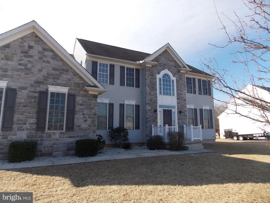 Very large 4 BR 2.5 bath luxury two story.  Over 3200 fin sq ft above grade.  Gleaming hardwood floors. Gourmet kitchen with new appliances, down draft center island cook top.  Master suite with a large sitting room.  Huge walk in closet.  2 person jetted soaking tub. Jack and Jill bath. Gas Fireplace, 20'x20' deck,level yard, oversized paved driveway, dual zone upgraded Heat Pump. First floor den