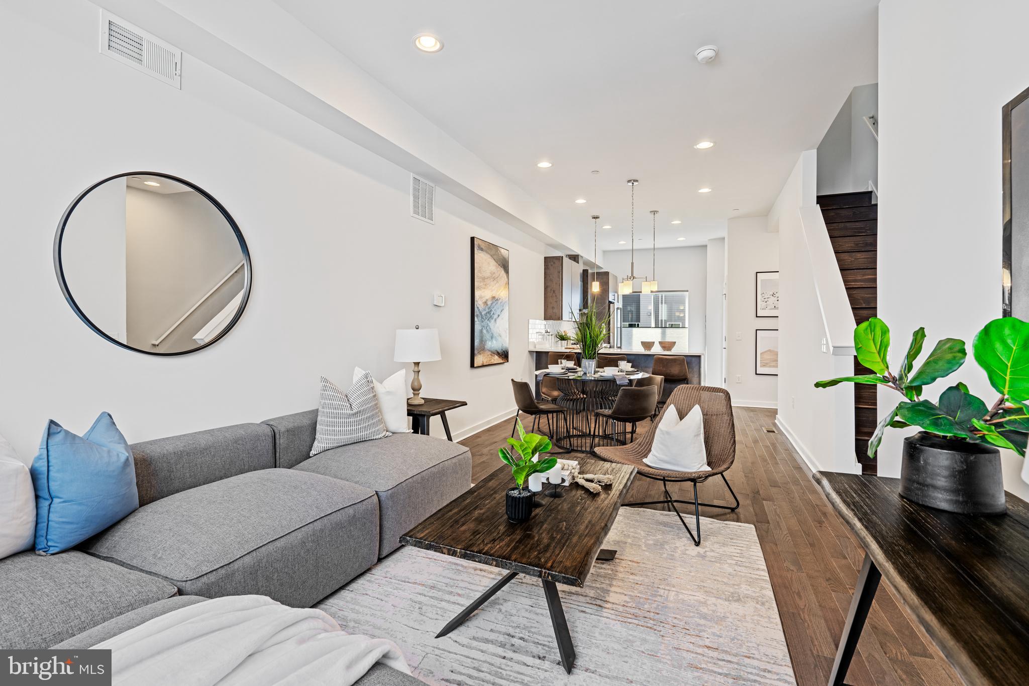 Welcome to 1634 N 5th Court! This stunning home spanning an impressive 2250 square feet over 4 stories comes with 3-bedrooms, 2.5 bathrooms, and a spacious finished basement all providing ample space for comfortable and luxurious city living. Built just 4 years ago, this residence boasts a seamless blend of sleek design. As you step inside, you'll immediately notice the abundance of natural light that floods through the large windows. The hardwood floors throughout all levels add a touch of elegance to the interior. The kitchen features stainless steel appliances and tons of cabinetry for storage. Upstairs you will find 2 spacious bedrooms and 1 full bathroom, followed by another level housing your primary suite. This home has 2 outdoor spaces including a spacious rooftop deck & one balcony conveniently situated outside the primary bedroom. Furthermore, as a designated Keystone Opportunity Zone, this property brings additional tax benefits, making it an enticing option for those seeking a primary residence that offers both comfort and financial advantage. The 1-CAR GARAGE ensures convenience and security. In close proximity to all of the restaurants, churches, coffee shops, gyms and grocery stores that Kensington and nearby Northern Liberties has to offer, this home is in a perfect location. 6 years remaining on tax abatement! MORTGAGE ON PROPERTY IS ASSUMABLE AND IS AT AN INTEREST RATE OF 2.875% (PENDING BUYER APPROVAL FROM BANK). Schedule your showing today!