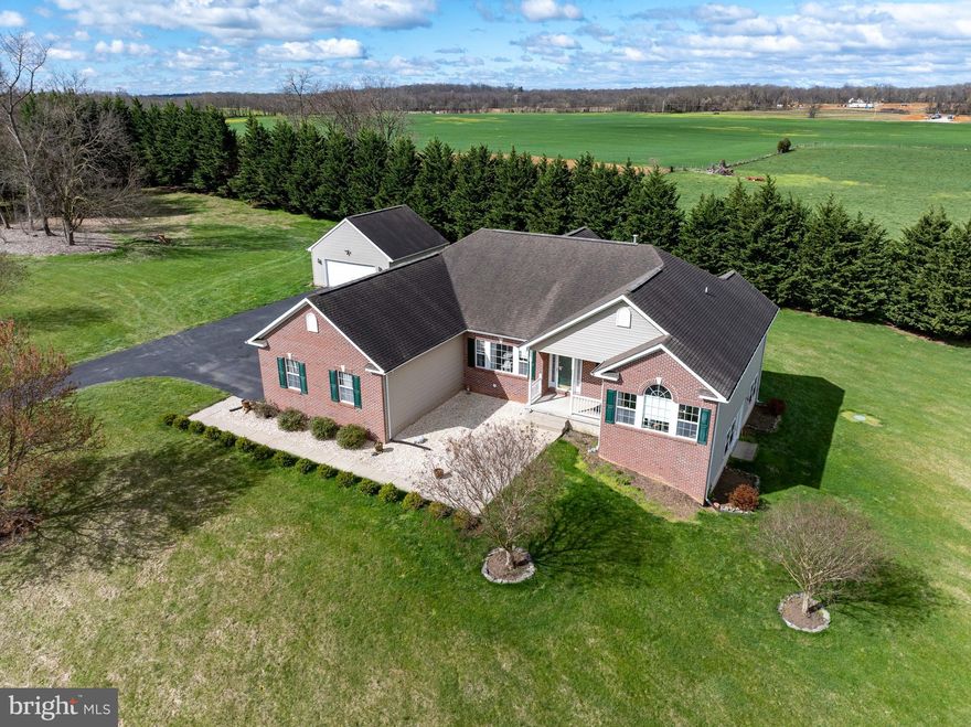 Seller offering 20K for rate buy down, closing costs, cosmetic upgrades! Located near the Historic and charming Town of Shepherdstown. Surrounded by endless mountain views and pasture, this 3 acre lot is very private and well landscaped. Great layout in this open floor plan main level living and fully completed lower walk out level. Recently completed lower level, features a spa like bath, large 2nd kitchen, laundry room and large living space. Use the side walk out to access the yard. Perfect space for expanding future outside living areas. Current owners uses as an in law space and was thoughtfully designed. The main level features updated kitchen with new countertops and appliances. Large screened in porch off of the kitchen for casual living. Split Bedroom Layout.  Large primary suite with 2 walk in closets. 3 additional bedrooms. Great room has gas fireplace with mantle. 2 car attached garage and a detached 24 X 24 garage with 100 amp/240 v electrical service and fully insulated. Updates include new furnace w/air scrubber and humidifier, water heater and water softener all replaced in 2022. Don't miss an opportunity in this hard to find single level living on acreage in Shepherdstown.