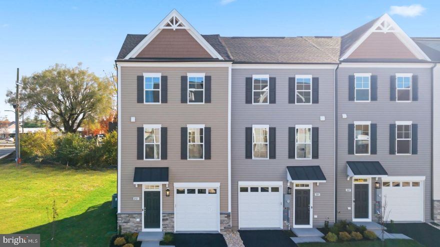 END UNIT Luxury 3 level/3-bedroom townhome with 1 car garage located in the heart of Winchester! Possibility of 4th Bedroom/flex base in the basement available! ***OFFERING UP TO $12K IN CLOSING COST ASSISTANCE FOR PRIMARY RESIDENCE WITH USE OF APPROVED LENDER AND TITLE!** SPECIAL INTEREST RATES AVAILABLE** CONTACT SALES CONSULTANT FOR DETAILS*
MOVE-IN READY! Explore Winchester’s new luxury townhome community. This three level end unit home features three bedrooms, three and a half baths, and bright box bay window in the rear. An attached one car garage provides easy parking and storage. Inside, the kitchen stands out with an extended island that seats four at counter height, range hood, and wall oven. The first level includes a private finished recreation room and possible 4th bedroom with its own full bath and walk in shower, perfect for guests or a home office. Laundry hookups are conveniently located on the third level near the bedrooms. Step outside to a 10X14 maintenance free deck, ideal for relaxing or entertaining. Upgrades throughout make this home truly shine. Come see it for yourself.