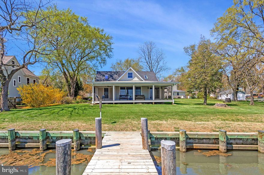 Discover your dream lifestyle in this exceptional  3 bedroom  2 full bath waterfront property located at 1268 Hayes Road in the charming community of Shady Side, MD. combining the peacefulness of a secluded setting with essential modern amenities. As you step inside you'll notice the sun drenched open floor plan complete with a large cooks kitchen featuring a huge center island, cozy breakfast nook and walk-in pantry. The adjacent dining room  is perfect for large holiday gatherings and flows seamlessly into a comfortable family room.  A gorgeous living room with waterfront views divides 2 ample sized bedrooms for privacy and relaxation.  Enjoy sweeping views of your very own cove or dine al fresco in the fully screened in porch.  Upper level features the 3rd bedroom offering a private home office,  abundant built-in drawers and  shelving plus an elevated deck for morning coffee.  The half acre lot is brimming with seasonal plantings, lush lawn, a two car garage and your very own dock. This is the perfect setting for those who love boating, fishing, or simply enjoying spectacular water views and stunning  sunrises.  Don't miss the opportunity to create your own waterfront haven just in time for summer! Recently renovated to include 2 brand new bathrooms, interior flooring, screened in porch, and much more! See upgrades sheet for full list of upgrades.

If you are interested in learning more about this remarkable waterfront property, reach out to the exclusive listing broker Casey A. Sutherland with Maryland Waterfront Properties.