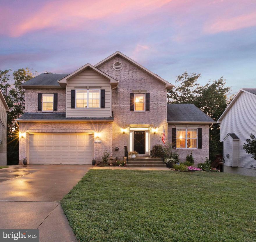 Don't miss this beautifully upgraded home located on a cul de sac street, just a few minutes south of PAX (think less traffic!). New roof, new deck, and new tankless water heater! This awesome 5 bed/3.5 bath home has been tastefully decorated and boasts gorgeous upgrades! Custom made Alderwood kitchen cabinets with quartz countertops. Gourmet Kitchen Aid appliances, pot filler, pressurized garbage disposal,  and soft-close drawers. Beautiful hardwoods floors, crown molding, and updated lighting. The spacious owners suite features a walk-in closet with custom closet organizer and ensuite master bathroom with soaking tub and separate tiled shower. The fully finished, walk-out basement features a large bedroom, full bath, and spacious rec room area. Enjoy a relaxing evening on the private, composite and solar lit deck. Assumable VA loan at 2.25%