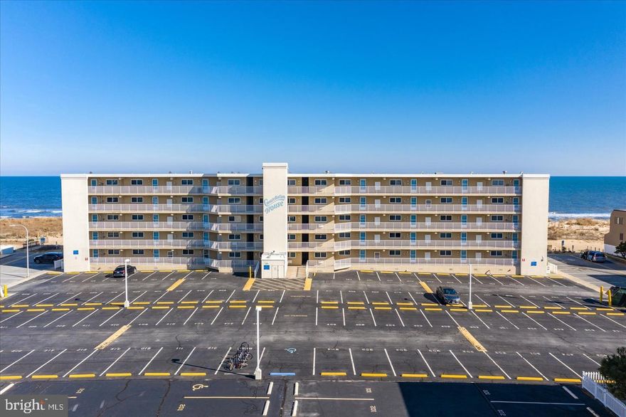 Beautifully renovated oceanfront condo in midtown Ocean City.  This condo offers one bedroom, one full-bathroom, one half-bathroom and an open living area.  The living area features the nicely furnished living room with vinyl plank flooring, a dining area and a fully equipped kitchen.  The kitchen has been updated with the popular shaker-style cabinets, stainless-steel appliances and solid-surface countertops.  There is a private balcony off of the living area that offers rare direct beach access.  This is a great place to relax, unwind and enjoy the tranquil setting.  The full-bathroom is centrally located and easily accessible from throughout the condo.  The full-bathroom has been updated with a new vanity, vanity top, fixtures and a tile shower surround.  The bedroom is generously sized and offers plenty of space for a variety of configurations, as well as an ensuite half-bathroom for convenience. The Constellation House building is well-managed and offers an elevator and assigned parking. It is within a short walk to restaurants, shopping, water-sports, amusements, night-life and more.  This is easy oceanfront living, just in time for the upcoming season.