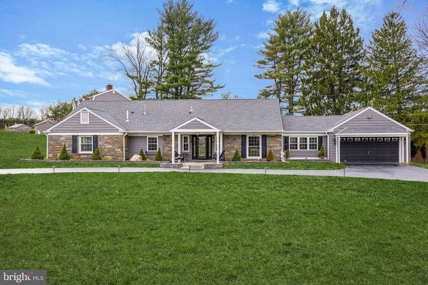 Welcome to 800 Louise Drive — a truly one-of-a-kind, designer-curated home located in the desirable Beatty Hills subdivision. This stunning residence blends high-end craftsmanship with modern functionality and is tucked at the end of a quiet cul-de-sac in the sought-after Marple Newtown School District. Sitting on just under an acre of land, this five-bedroom, four-full-bathroom home has been completely reimagined from the ground up. Gutted and rebuilt with brand new framing, systems, and finishes — every inch was thoughtfully designed by a professional home designer who poured passion and precision into every detail.

From the moment you pull into the horseshoe driveway, you’re greeted by a charming front porch and show-stopping curb appeal. Step inside and experience a home that flows effortlessly, where each space accentuates the next with perfect symmetry and intentional design. The main level offers an expansive open-concept floor plan anchored by a dramatic double-sided fireplace that seamlessly connects the living room and the heart of the home — a chef’s kitchen outfitted with top-of-the-line KitchenAid appliances, wine fridge, prep sink, striking black fixtures, and a massive island perfect for entertaining.

Also on the first floor are three generously sized bedrooms and two full bathrooms, including a luxurious primary suite with a spa-like walk-in shower and a custom walk-in closet. A convenient first-floor laundry room and access to the oversized two-car garage make everyday living easy. Upstairs, you’ll find two additional bedrooms and another full bathroom, along with a dedicated HVAC zone — perfect for added comfort and efficiency.

The finished lower level offers approximately 2,400 square feet of versatile space, already equipped with a full bathroom, a full perimeter French drain system, two sump pumps, a whole-house water softener, dual oversized water heaters, and 200-amp electric service with a whole-house surge protector. The brand-new 500-gallon propane tank is buried and owned — not leased — for added peace of mind.

Out back, enjoy a large concrete patio, a flat fenced-in yard, and an attached shed — perfect for outdoor living, relaxing, or entertaining guests.

Located just five minutes from downtown Media, and only 15 minutes from both Center City and Philadelphia International Airport, this home offers convenience, privacy, and style — all in one. With every system, fixture, and finish brand new, this property is more than move-in ready — it's a turnkey masterpiece. 800 Louise Drive isn’t just a home — it’s a statement, and a rare opportunity to own something truly special.