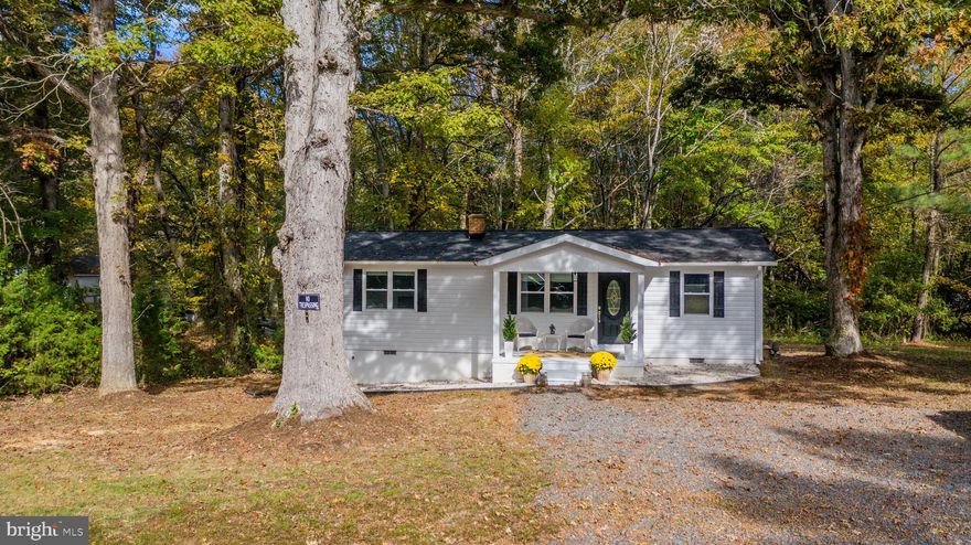 Nestled among trees, this charming ranch style home sits on 3 peaceful private acres. It has been renovated, featuring a brand-new roof, new HVAC system, new well, all new windows, luxury vinyl plank flooring, and modern style kitchen and bath. The bright white kitchen is filled with natural light and showcases stainless steel appliances, a white subway tile backsplash, and a farmhouse-style stainless sink framed by a sunny window overlooking the landscape and wildlife. The flexible floor plan includes three bedrooms, with one ideal for a home office or guest room. The inviting family room flows seamlessly into the dining area and opens through sliding glass doors to the expansive backyard, surrounded by mature trees and lush greenery. With no HOA, the three private acres offer ample space for a variety of hobbies, a garden, entertainment, or simply unwind and enjoy the beauty of your natural surroundings. Grainery Road is being transformed, don't miss out on this amazing opportunity! Call today to schedule an appointment!