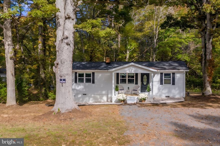 This ranch style home sits on 3 private acres surrounded by trees.  The home has been fully updated with a new well, roof, HVAC system and windows.  The kitchen features stainless steel appliances, subway tile backsplash, and a farmhouse sink with a view overlooking the yard.  There are three bedrooms, with one that could also be used as an office or guest room. The family room connects to the dining area and opens to the backyard through sliding glass doors, making it enjoy the outdoor space.  With no HOA, the property offers plenty of room for outdoor activities, gardening, or for expansion.  The neighborhood is undergoing development, with home improvement projects beginning along this street.  Call today to schedule an appointment!