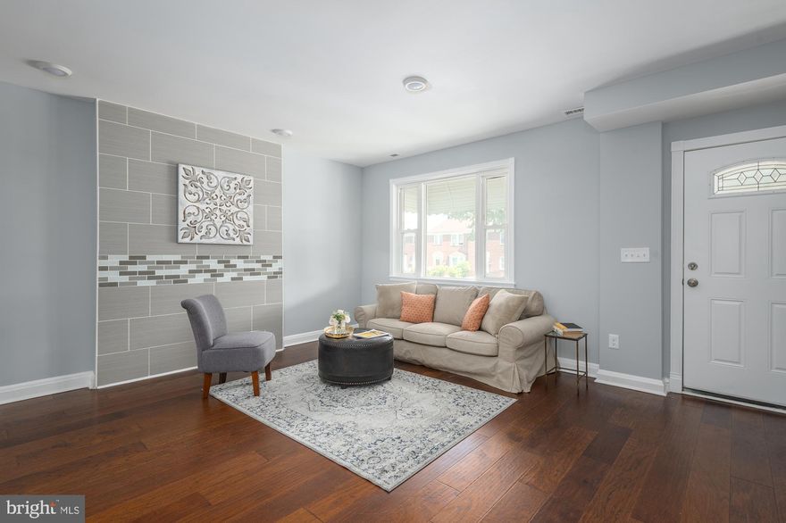 Beautifully renovated townhome ready for the most discerning buyer.  Neutral palette throughout to compliment any style from modern farmhouse to industrial.  Enter the living room with updated flooring and tiled accent wall as a main focal point.  The chef's kitchen features white shaker cabinets, granite counters, mosaic tile backsplash, and modern stainless steel appliances.  Enjoy breakfast at the sunny bar area or in the spacious dining area..perfect for entertaining as well.  Upstairs you will find three nice sized bedrooms and a tastefully renovated bathroom.  The basement is finished featuring a large family room/recreation room area and renovated full bathroom.  The shady backyard is the perfect locale to relax on a warm afternoon or let your four legged friend(s) enjoy the outdoors.