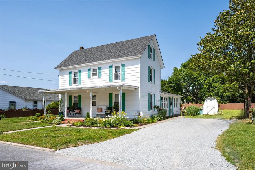 Remodeled Farmhouse style home with a covered front porch for sitting out on a summer night. This spacious 4 Bedroom, 2 Bath home features a first floor Primary Bedroom with a large bath, Eat-in Kitchen and formal Dining Room. Upstairs you will find 3 more bedrooms with a newly remodeled bath with an elegant Vessel Soaking Tub. Each room has plenty of closet space and with a full floored attic, there is plenty of room for everything.  A brand new High Efficient Ductless Heating and Air system keeps the home comfortable while keeping the bills down. With a new roof and new appliances, there will be little to worry about. The backyard is private oasis with a privacy fence wrapping around, so you can grill, game, sit by the fire ring and wonder why you didn't do this sooner. The seller is also going to include a 4 person soft sided Hot Tub, because that makes nights out watching the stars - Magic!  There is an outside storage shed for  your yard stuff, and your bikes, because you will want to get out in Snow Hill, to the parks, scenic Pocomoke River,  the galleries, shops, restaurants, and bars downtown. With plenty of festivals & events, a Farmers Market and the 1st Friday Art Strolls, Snow Hill has plenty to do. Home is located so close to the Amazing Snow Hill Schools that kids don't have to even need to ride a bus. And It is located between the Amazing Beaches of Ocean City, Chincoteague Island VA, and Assateague Island National Park. Close enough to Nasa's Wallops Island that you can see the rockets launch from your back yard.