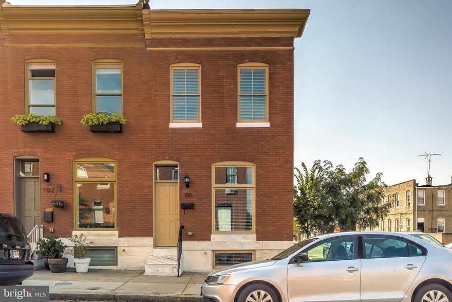 POLISHED END OF GROUP CHAP TAX CREDIT RENOVATION W/ 3 FINISHED LEVELS AND OFF STREET PARKING - located just over a block away from Patterson Park on quiet dead end street this large over 14' wide  light filled end of group offers buyers an open floor plan with hardwood floors throughout, exposed brick, crown molding, upgraded window/door casing, separate dining area and large island kitchen with granite counter tops and ss appliances leading to your parking pad.  Upper level offers two generous sized bedrooms, rear deck and super bath with both tub and luxurious shower.  Fully finished light filled basement with full bath, laundry area and walk out rear bedroom make this a great home for roommates.  Approximately 1.5 years remaining on chap tax credit - annual taxes just $2449!!