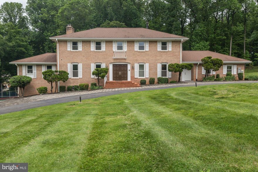 Lovely custom home on fenced 2-acre south-facing lot in a lush and exclusive Potomac neighborhood - just outside Potomac Village. Priced below market. Original owner has renovated the home and replaced all systems; like-new condition. Over $300,000 in recent upgrades. House staged and shows beautifully. All brick exterior, circular driveway, brand new top-of-the-line outdoor kitchen with spa.