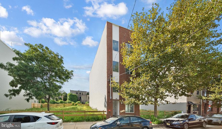 Welcome to 1950 N 6th St #2 – a bright, modern bi-level condo offering 2 bedrooms, 2 full bathrooms, and a private roof deck, all just steps from the vibrant energy of Fishtown and Northern Liberties.
Built with contemporary design in mind, this newer-construction home boasts an open layout, abundant natural light, and stylish finishes throughout. The kitchen is equipped with stainless steel appliances, ample cabinetry, and plenty of prep space—perfect for home cooking or entertaining.
Both bedrooms are generously sized, with sleek, updated bathrooms nearby that add a touch of luxury to daily living.
Upstairs, the showstopper awaits: your own private roof deck with sweeping city views—ideal for relaxing, grilling, or taking in unforgettable sunsets.
Situated in a rapidly growing neighborhood with easy access to restaurants, cafés, bars, and public transit, this home combines modern comfort with everyday convenience. Whether you’re a first-time buyer or looking to upgrade, this property is a must-see. Seller is highly motivated!