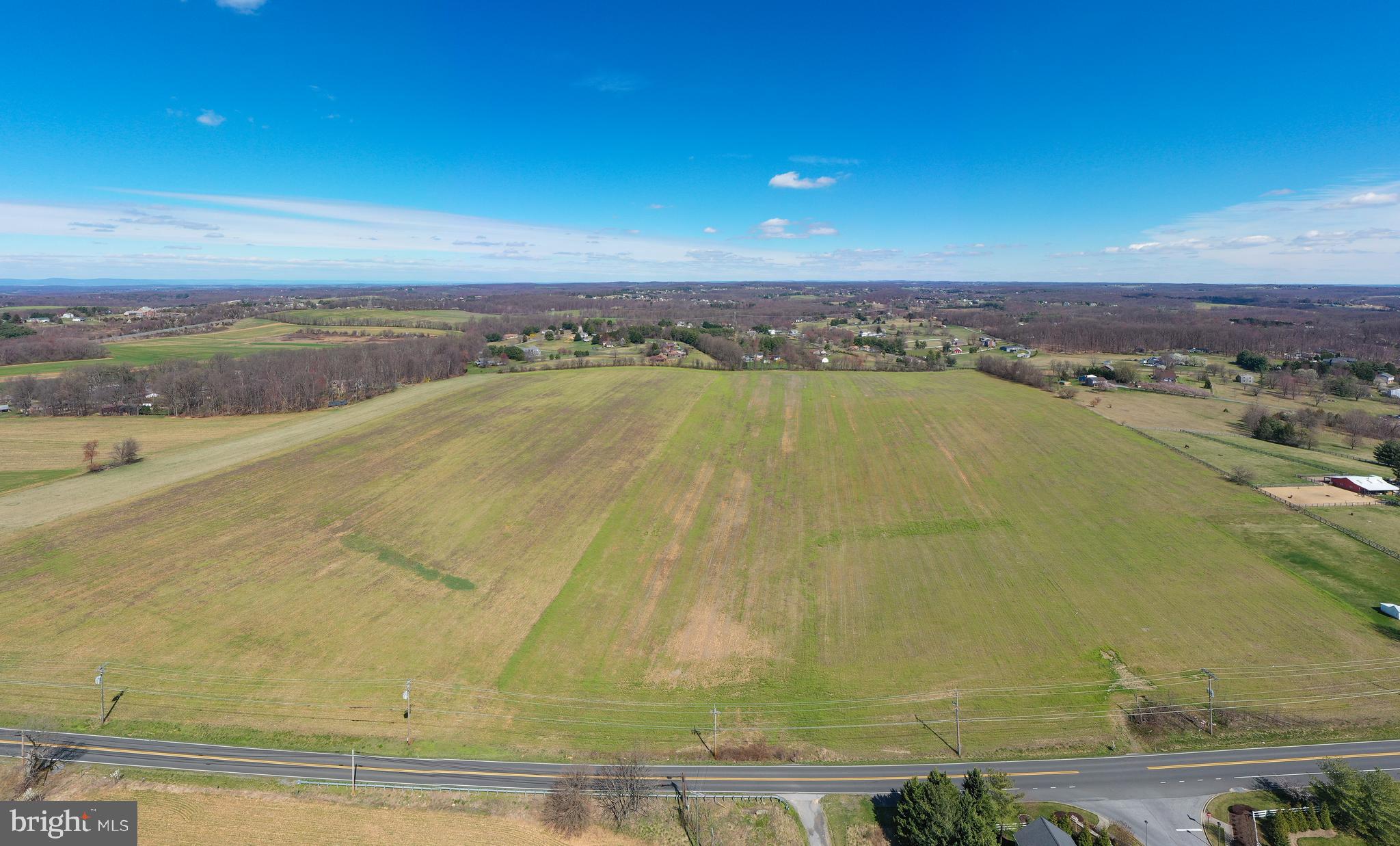 Beautiful farmland located in the heart of Mt. Airy. This 50.98 parcel is currently being used as ag but is zoned R40,000. Based on the size, location, and zoning (potential for subdivision) there are many exciting opportunities with this one. The parcel is being sold “as is”. There is one well on the property. All subdivision plans would need to be approved by city/county jurisdictions. There is ag rental income potential while undergoing development opportunities.