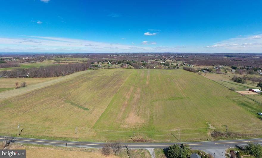 Beautiful farmland located in the heart of Mt. Airy.  This 50.98 parcel is currently being used as ag but is zoned R40,000.  Based on the size, location, and zoning (potential for subdivision) there are many exciting opportunities with this one.  The parcel is being sold “as is”.  There is one well on the property.  All subdivision plans would need to be approved by city/county jurisdictions.  There is ag rental income potential while undergoing development opportunities.