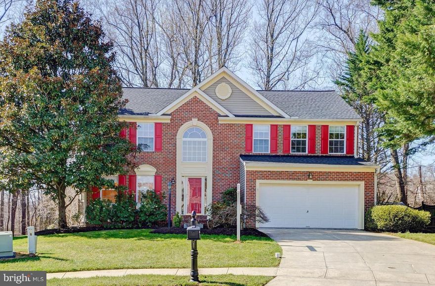 COMING SOON! Southern Exposure! This home shows like a model. With more than 3,000 sqft of living space, this home features four bedrooms and 2.5 baths. New Carpet throughout, New Kitchen and Bathroom Floors. 2013 HVAC Replacement, 2017 Hot Water Heater, Dec 2019 Roof. Upon entering the home you have hardwood floors that carry through to the Kitchen.  The spacious kitchen has dark wood finishes on the cabinets and an open floor plan that leads to a breakfast table area and family room. A gas fireplace compliments the room and helps unwind or gather with friends and family when it is cold outside. The upper level of this home has four bedrooms and two full baths.  The master suite is the perfect retreat is over-sized with a luxurious master bathroom and a two person walk-in closet. The master bath includes a large soaking tub,  separate shower and large counter area featuring dual vanity sinks. The  three secondary bedrooms have loads of space and great views to the wooded conservation area in the back of the property. Finished basement with a Wet Bar and large storage space. Just minutes to 95, shopping and restaurants. You don't want to miss this one!