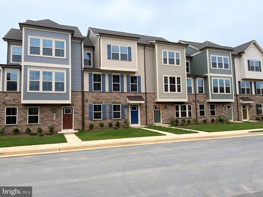 22' wide Ryan Home Serenade Model in sought after Stone Barn Village inside The Villages of Urbana! 2 car garage, 4 Bedrooms 3.5 Baths, and a covered deck off the kitchen for easy outdoor living. Entry level: 4th bedroom , 3rd full bathroom, LVP flooring, and extra large 2 car garage in the back; Main Level: LVP floor on entire main level, open concept kitchen with large island and pendent lights, opens to dining room and living room. Upstairs: Owner’s suite with generous walk-in closet, tray ceiling, dual vanity, and seated shower. 2 other large bedroom with good size closets. Laundry is at bedroom level as well. Additional highlights: energy efficient building; walking distance to Stone Barn community center,  and Sugarloaf Elementary school, great blue-ribbon schools; walking distance to Urbana Community Park, Urbana district park, easy access to 270. Award winning planned community with abundant community amenities: walking/biking trails, shops, restaurants, community pools (including one recreational water park), community centers, basketball courts, tennis courts, state of the art library, seasonal farmer's market, and multiple playgrounds/parks. Available for 8/1 move in. Check out the video tour of the home.