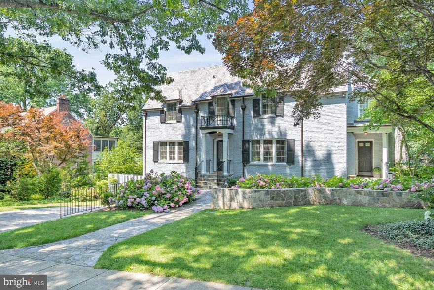 This fantastic 5 bedroom, 4.5 bath home on a spacious quarter-acre lot in the heart of Spring Valley. The center hall floor plan features beautiful workmanship across three floors of living space and features ample natural light and gleaming wood floors. The first floor has a formal dining room featuring seating for 6 or more, a beautiful living room with fireplace, an open and gourmet kitchen with a breakfast nook and stainless steel appliances, a sun-drenched family room, and a powder room. The second floor has a large primary suite with updated bathroom, 3 additional bedrooms and 2 additional baths. The lower level has a large recreation room, office, bedroom, and full bath. The impressive backyard has been completely renovated and has a spacious flagstone terrace with built-in chimney/ fireplace, a professionally landscaped garden, and swimming pool with built-in hot tub. Garage and driveway parking completes this fabulous offering.