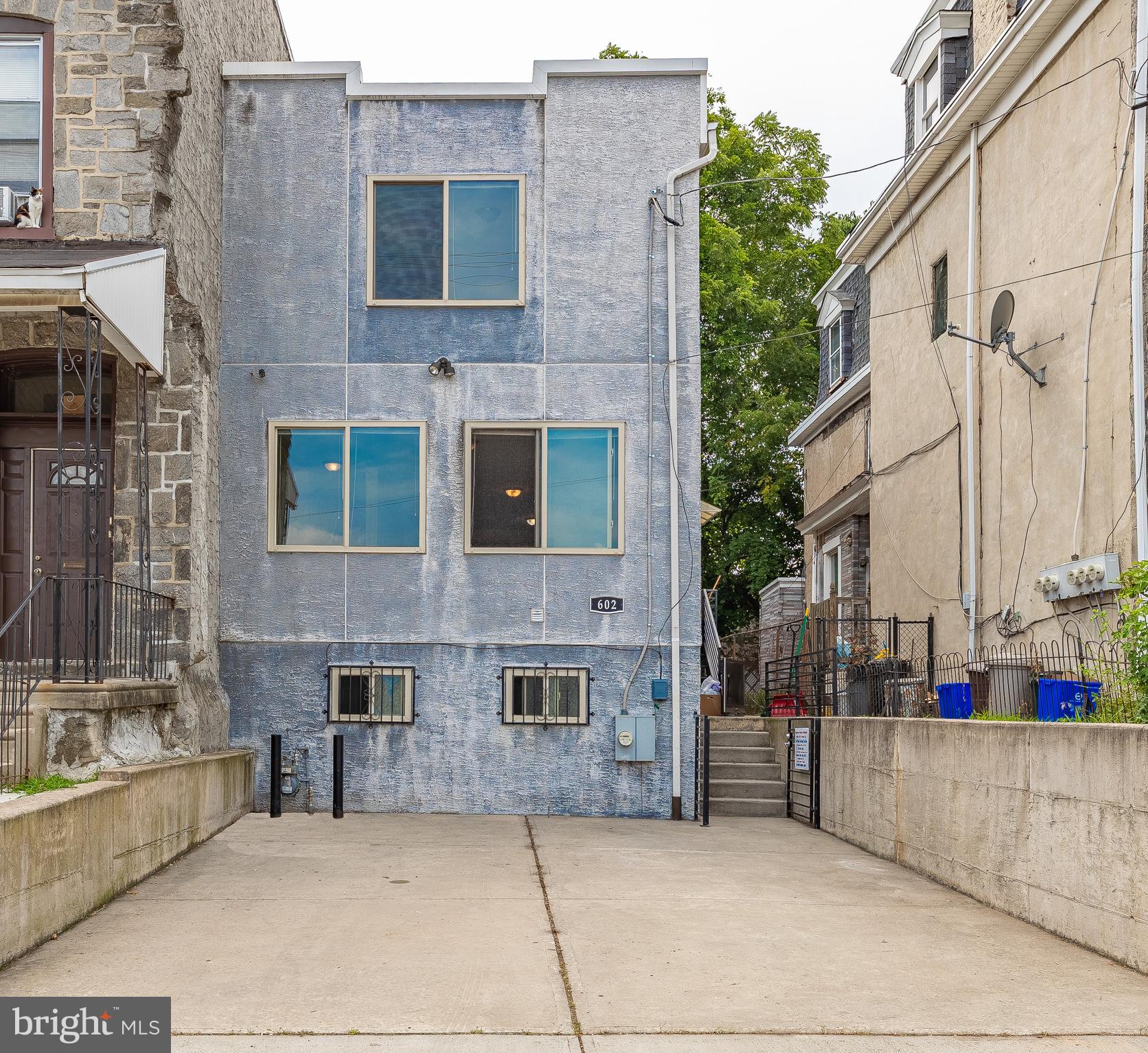 Exceptional investment opportunity! This spacious 6-bedroom, 4.5-bathroom home is perfectly positioned minutes from Drexel and UPenn campuses, ideal for multi-family living or high-yield student rentals.
Built just 10 years ago, this well-maintained property features an open-concept kitchen and living area, plus thoughtful bedroom distribution across multiple levels. Two bedrooms include private en-suites, while additional bedrooms share well-appointed bathrooms with modern fixtures. The private, low-maintenance backyard provides outdoor entertaining space.
Practical amenities include a 4-car driveway eliminating parking concerns and newer construction requiring minimal maintenance. The layout and proximity to universities create strong rental demand from the college community.
Located in a desirable Philadelphia neighborhood, residents enjoy easy access to world-class dining, cultural attractions, and entertainment while maintaining comfortable residential living. This rare combination of size, location, and condition offers excellent potential for both large families and savvy investors.
Schedule your showing today to see this standout property in today's competitive market.