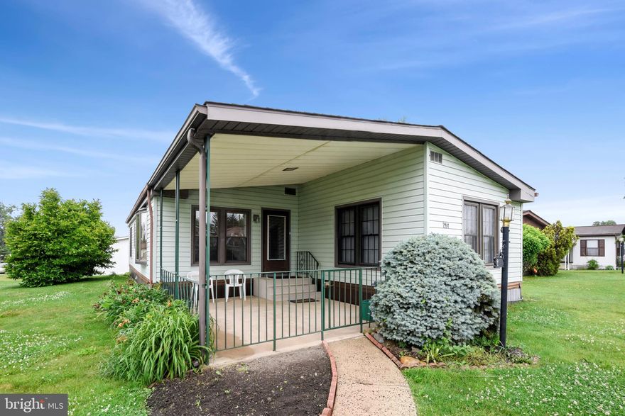 This beautiful mobile home has been well maintained, and is freshly painted, so just bring your bags and move in!  This 55+ community has tons to offer in activities and amenities.  This particular home is a double wide, and on a nice lot.  Home also has a 16'x16' covered porch.  Truly a must see!