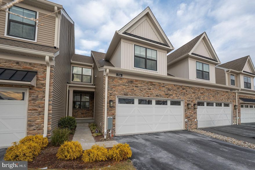 Experience the perfect balance of sophisticated urban living and natural tranquility at this beautiful Carriage Collection townhome in Franklin Station.  This stunning 3-bedroom, 2.5-bathroom home offers a rare opportunity to own a modern sanctuary in highly sought-after Rose Tree Media. Designed with an eye for luxury and a layout built for effortless entertaining, this home is the epitome of "turn-key" living.  As you enter from the covered front porch, you’ll find an airy, light-filled floor plan where high-end finishes take center stage. The heart of the home is the gourmet kitchen, meticulously designed for both the home chef and the frequent host.  It features sleek quartz countertops, an expansive island, and premium stainless steel appliances.  It flows seamlessly into the dining and living areas, creating a cohesive space for relaxation.  Off the kitchen is access to the trex deck.  Unlike many of the townhomes in the development, this outdoor space offers incredible privacy. The rear of the home backs up to a lush, protected green space, providing a peaceful forest-like backdrop. Enjoy your morning coffee or evening wine on the private deck while soaking in the sights and sounds of nature—your own quiet escape from the hustle and bustle.
The main floor also offers a half bath, laundry room, entry from the 2 car garage, and striking hardwood flooring throughout.  
On the 2nd floor, the primary bedroom is a true retreat, featuring vaulted ceilings, a generous walk-in closet outfitted by California Closets, and a spa-like ensuite bathroom.  There are 2 additional spacious bedrooms with plenty of additional closet space.
The huge basement offers a ton of potential for finishing, complete with plumbing for an additional bathroom.   The opportunities abound here to create another magnificent living space!
The home is situated in close proximity to the community center, gym and outdoor pool.  From Franklin Station you can easily access upscale shopping centers and restaurants, downtown Media Boro, the Philadelphia Airport, theaters, public parks, Tyler Arboretum and so much more!  This home is a “must see” in an unbeatable location!  List of upgrades and amenities is available.