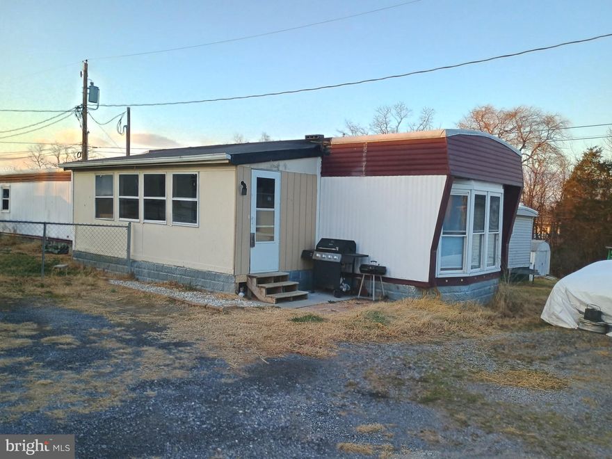 Upgraded and spacious trailer home with lots of natural light. Large kitchen with eat-in area. LVP flooring throughout the house. Large covered patio in front of the house great to use as sun-room or workshop. Decent sized separate shed in the dedicated yard. Water and sewage included in the rent. Quiet and nice neighborhood. Agent owner.
