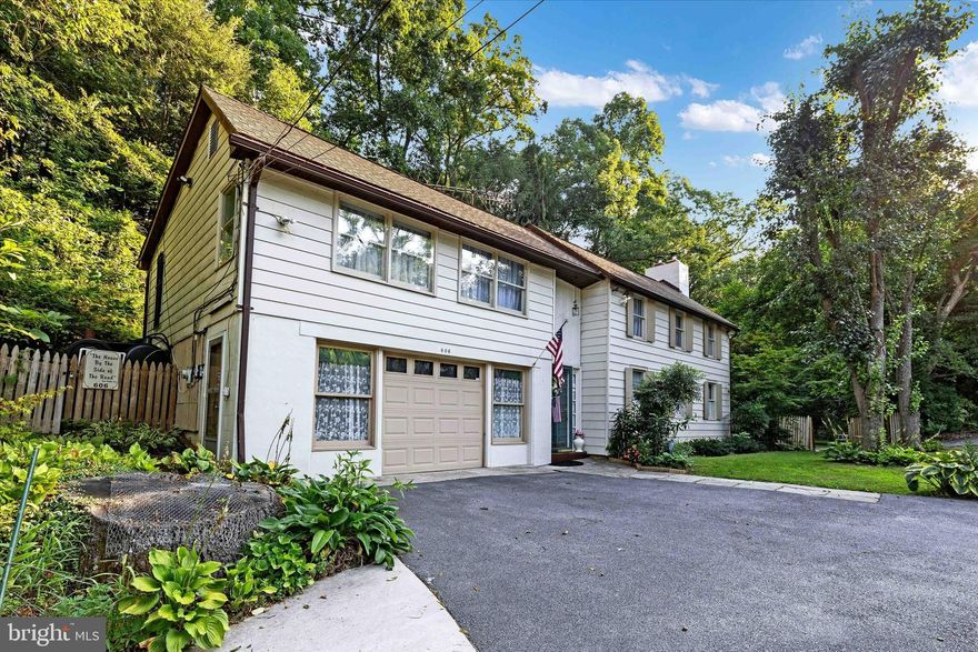 ***  This SPACIOUS two story COLONIAL style home built in 1920 will  charm you from the moment you enter!  The STYLE and CHARACTER  of this more than a century old home will ASTOUND you as you make your way through each and every room!    THREE and a half baths, THREE kitchens, and a wall  of triple pane SLIDING glass doors await you at the back of the home PRESENTING a wonderful PICTURE like view of the multiple variety boxwood garden! The current primary bedroom setting with wall to wall walk-in closet, SLEEPING porch as it was called in the day (second story screened in porch off of primary bedroom)  or you could convert the entire upstairs living quarters area into a LAVISH primary suite!  Check out the FLOOR PLAN diagrams and note the other large bedrooms as well.  The attached expansive enclosed porch off of the main kitchen area makes a great PANTRY and also has floor access to the basement area to make stocking wood for your Fisher WOODSTOVE a breeze!  The fire bricked woodstove with a heat distribution hood installed overtop is connected to the duct work system of the home as an alternate heating system if desired and also great for a power outage situation!  Central heating system also includes 2 forced air furnaces with separate zones!  Wow ... the attached GARAGE actually boasts a full kitchen complete with a dishwasher (great for large gatherings and crab feeds), storage closets and still room for your car!  From the garage there is handicapped access with a removable ramp to the main living area.  One of the full baths in the first floor was designed with handicapped accessibility as well.  AMPLE PARKING BEYOND DRIVEWAY AND GARAGE WITH GATED PARKING PAD TO RIGHT SIDE.  Are you looking for that CLOSE to just about everything with that traditional COLONIALfeeling  abounding with NATURES abounding SERENITY?  Look no further,  this PROPERTY with its FLOWING stream, mature WOODS , a  MULTIPLE variety mature BOXWOOD garden, yard and BEAUTIFULLY landscaped areas will not disappoint!  TWO separately deeded properties with just a little over 6 ACRES combined in Baltimore county school district  and  about 2 miles from I-83 at the MARYLAND/PENNSYLVANIA line!  This beautiful Baltimore county property is zoned RC2 and is a real TREASURE!
To the rear of the property is a large equipment storage shed.  Also convenient to the rail trail at the Freeland entrance.  Any questions concerning building on the separate lot should be directed to Baltimore county.   This property being sold as is with a HOME WARRANTY and waiting for its new owner!  Seller is motivated and ready to entertain your offer!