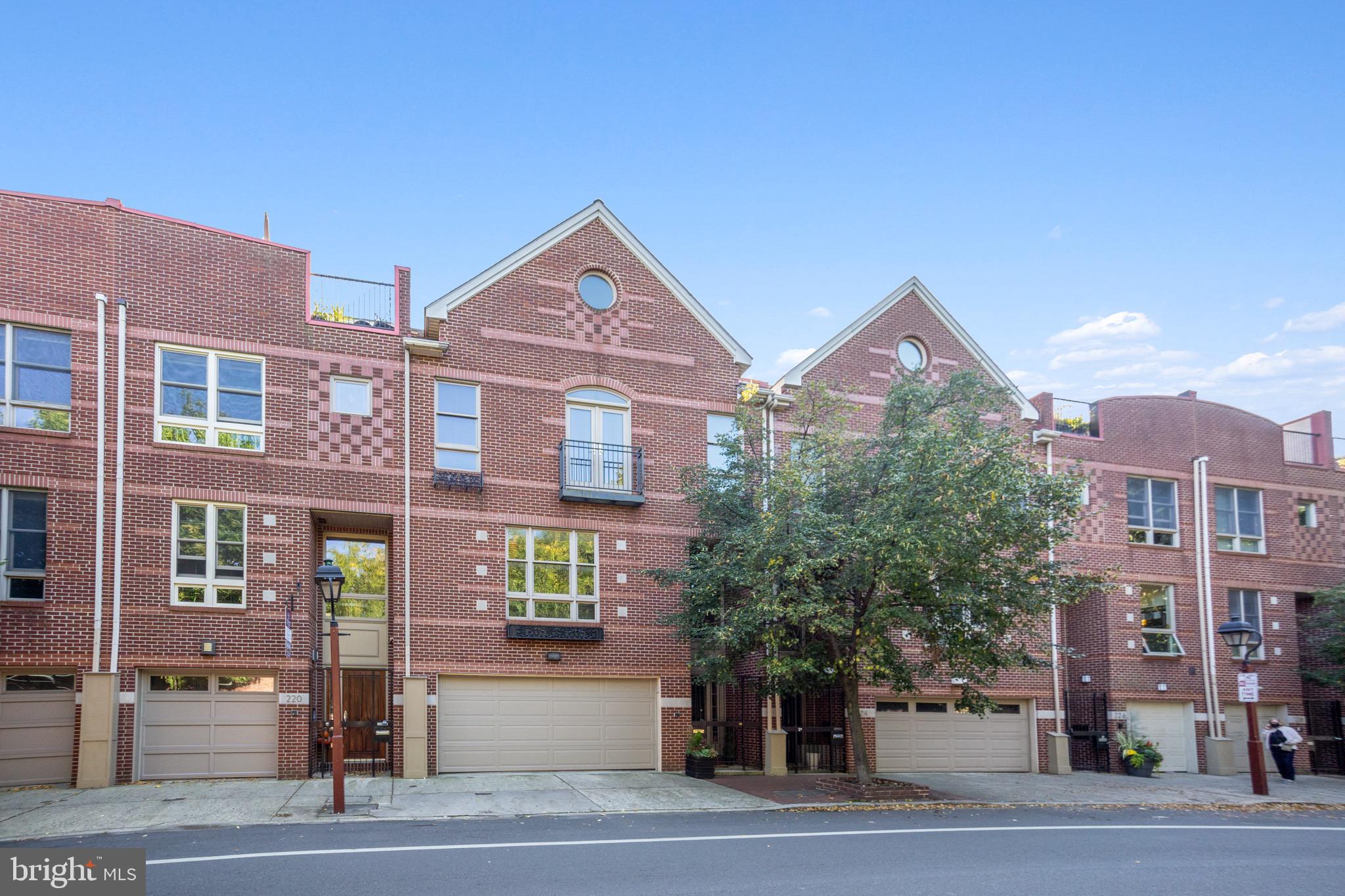 Luxury awaits you at 222 Lombard Street, nestled in Society Hill, one of Philadelphia's most sought after neighborhoods. A rarely offered double-wide home (27 feet) has a 2 car garage and 3 outdoor spaces! The kitchen is a chef's dream with its many 42" wood cabinets and moldings, granite countertops, butler's pantry, wine fridge, and newer Viking appliances, including a French door double wall oven and a 5 burner cooktop. Off the kitchen is a spacious formal dining room with a unique built-in china cabinet. It is the perfect place to host large gatherings and entertain for years to come. Unwind with your loved ones after a long day in the living room with gas fireplace, or the cozy family room that offers a Kolbe cafe window and view of the courtyard's fountain. A bright and airy home with great natural light, recessed lighting and hardwood floors throughout. Upstairs, you'll find two, rather than one, master bedroom suites. The first suite features a gas fireplace, hall of closets, a four piece bath with his and her sinks and a flex room to use for anything your heart desires. In the second suite, which spans the entire fourth floor, you'll be greeted by three walk-in closets and a newer bath with a spa shower. The focal point is a large outside deck, which serves as your own private outdoor retreat. The 3rd bedroom is a bright room with French doors opening onto a Juliet Balcony. Relax and barbecue on an intimate 2nd floor deck or enjoy the peaceful 1st floor bamboo grove which offers a 3-story privacy screen and a green backdrop year-round. We can't forget the functional yet beautiful 1st floor laundry with a newer Whirlpool washer and dryer. Other thoughtful conveniences include built in speakers throughout, gas hookups on both decks, built- in ironing board in the flex space, Le Grand's Adorne outlets and receptacles, an attic ventilation fan, and a laundry chute. When you're ready for some fresh air, go for a nice stroll to the new 2nd Street Plaza (2021), Delaware River, Spruce Street Harbor Park, or Historic Philadelphia Trail. Or enjoy a restaurant meal outdoors (or in your own kitchen) while you watch the horses and carriages pass by. This location enjoys a walk score of 99, so the entire city center is within your reach! This home truly has all the bells and whistles you need to enjoy a comfortable, luxurious lifestyle in the heart of Philadelphia! Schedule your showing of this beautiful and spacious urban retreat before it's too late! SEE VIRTUAL TOUR AT: https://mls.homejab.com/property/view/222-lombard-st-philadelphia-pa-19147-usa PLEASE NOTE: 2021 real estate taxes are under appeal. PLEASE NOTE: Property owned by PA Real Estate Salesperson.