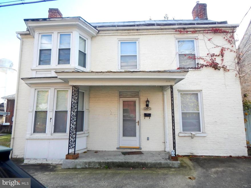 2 Bedroom, 1 Bath apartment. Two floors. Hardwood floors. Carpet in one bedroom. side and upper porch. 
Off street parking. Cats allowed.