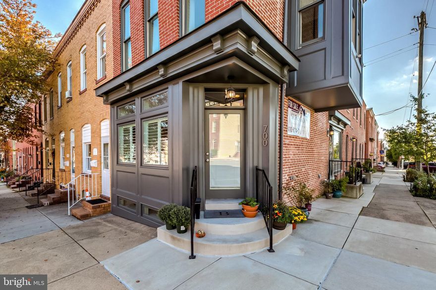 STUNNING 15+ FT WIDE END UNIT WITH 5 YEARS REMAINING ON CHAP TAX CREDIT. SUPER LOW TAXES - SUB $6,000 ANNUALLY! OVERSIZED GARAGE PARKING LOCATED IN THE HEART OF CANTON. GLISTENING HARDWOODS CASCADE THROUGHOUT. ENJOY CUSTOM WHITE CABINETRY, UPGRADED TRIM AND PAINT PACKAGE, IMPORTED TILE, DESIGNER LIGHTING, QUARTZ COUNTERTOPS, SS APPLIANCES IN DESIGNER CHEF'S KITCHEN. LOADS OF NATURAL LIGHT. 4 FINISHED LEVELS. 3,500+ SQ FT. HIGH CEILINGS. WALK-IN SHOWERS. WALK-IN CLOSETS. EXPOSED BRICK. 5 OVERSIZED BEDROOMS WITH 4 FULL BATHROOMS. GORGEOUS BATHROOMS INCLUDE FRAMELESS GLASS SHOWERS AND RAINFALL SHOWER HEADS. EXPANSIVE ROOF DECK FOR ENTERTAINING WITH STUNNING WATER AND CITY VIEWS WITH WETBAR. ENJOY SECONDARY GREAT ROOM ON 3RD STORY - GREAT FOR ADDITIONAL LIVING ROOM, THEATRE ROOM, GYM, OFFICE, OR PLAYROOM. CLOSE PROXIMITY TO RETAIL SHOPPING, LOCAL DINING, CANTON SQUARE, AND ALL MAJOR HIGHWAYS.