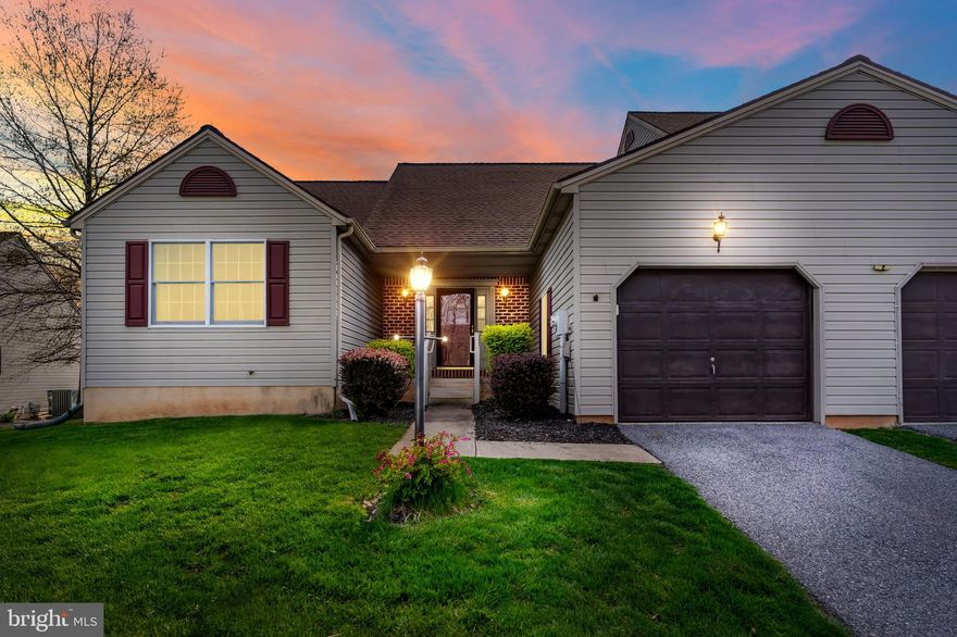 Welcome to 114 Megan Way, a beautifully maintained 2-bedroom, 2-bathroom end-unit townhouse offering the ease of one-floor living in a well-kept community. This home features an open-concept layout with vaulted ceilings in the kitchen, dining, and living rooms, creating a bright and spacious feel throughout the main living area. The kitchen flows seamlessly into the dining room and living room, making it perfect for entertaining or relaxing at home. A cozy gas fireplace anchors the living room, while the dining area offers access to the rear deck—ideal for enjoying your morning coffee or hosting guests.

The primary bedroom serves as a peaceful retreat with a large walk-in closet and a private full bathroom. The second bedroom is generously sized, and a second full bathroom adds convenience for guests or family. A dedicated first-floor laundry room adds to the home’s functionality. The full, unfinished basement features roughed-in plumbing and windows, offering great potential for additional living space, a home gym, or extra storage. Additional features include natural gas heat, a 1-car attached garage, and the added benefit of an HOA that covers lawn care and snow removal for low-maintenance living. Don’t miss this fantastic opportunity to enjoy comfort, convenience, and room to grow at 114 Megan Way.