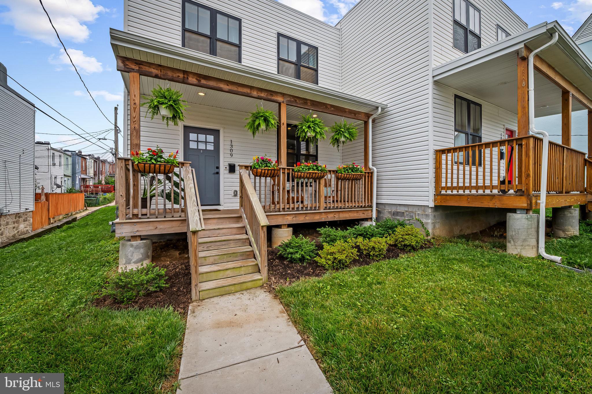 From the moment you walk through the front door, you know you’re not in just another new build. This semi-detached 2021 home is wide, bright, and brimming with style. Sunlight pours through oversized windows on three sides, hitting bold colors, striking finishes, and design choices that feel intentional, fresh, and full of personality. The open-concept floor plan was made for entertaining—imagine friends gathered in the kitchen with cocktails while music hums in the background and the conversation moves easily from kitchen to dining to living. Recently added wood floors on the main level bring warmth and richness to the space, enhancing the home’s elevated, modern aesthetic. The layout offers a sense of calm sophistication rarely found in newer construction, balancing openness with just the right amount of definition. The kitchen is a modern showpiece—designed for both daily living and entertaining—with sleek cabinetry, high-end finishes, and sightlines that connect seamlessly to the living and dining areas. Upstairs, you’ll find three spacious bedrooms, including a serene primary suite, along with two full baths and a well-placed powder room on the main level. A wide front porch sets the tone for stylish curb appeal, while private rear parking adds everyday ease. Sophisticated yet full of soul, this is a home that lives as beautifully as it looks. Located in Medfield, a small, close-knit community just a stone’s throw from Hampden, you’re never far from local shops, restaurants, and everything this beloved neighborhood has to offer.