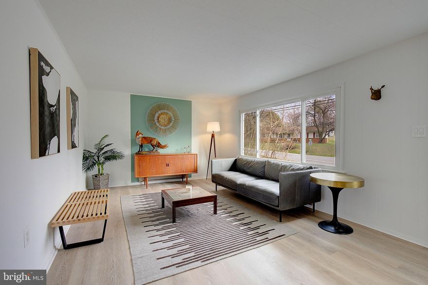 The beach is calling! Step into this charming 3-bedroom, 1-bath home at 5457 Bayview Ave, St. Leonard, MD, completely renovated in a boho-organic modern style. This beachside sanctuary features new LVP floors, a fresh kitchen with butcher block counters, gold hardware/fixtures & new appliances, a luxurious retreat-style bath with sage green custom tile, large vanity & gold accents, new architectural shingle roof, and new hot water heater. Enjoy the refreshed gravel driveway and fully fenced backyard - perfect for furry friends. Store the kayaks and bikes in the large back shed (as-is). New septic in 2016. Just steps to the Chesapeake Bay community beach for sand-beneath-your-toes vibes, plus a nearby marina/boat ramp for easy water adventures. Low $70 annual civic association fee + a one-time $17 key fee for secure beach and boat ramp parking access (fees subject to change; details at community site). May qualify for USDA loan with no money down for qualified buyers! Seller offering $5,000 closing cost credit if preferred lender is used. Broker/owner