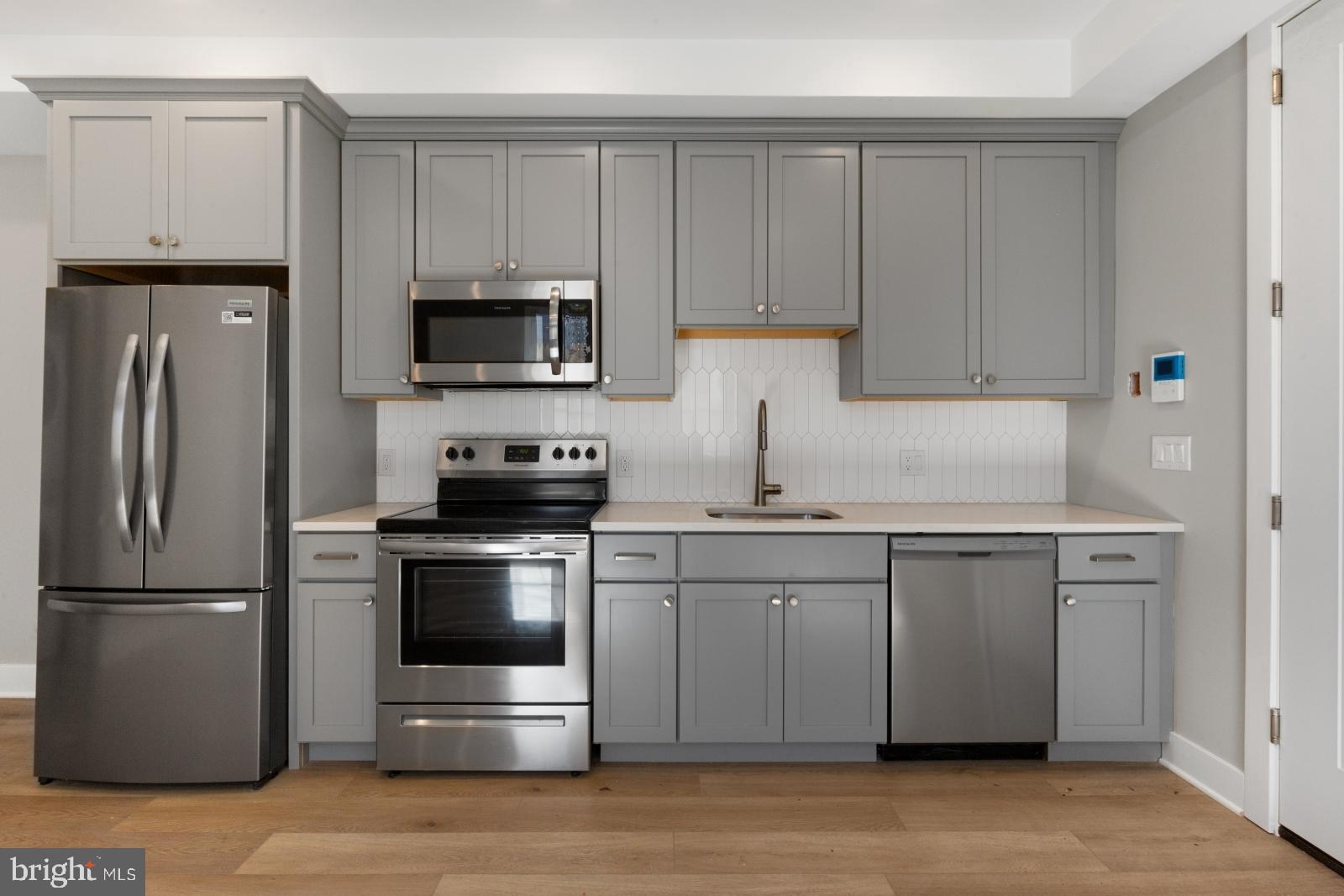 Available NOW:
Embrace modern living at The Ridgemont! This professionally managed building is proud to present OFF-STREET PARKING and secure entry with a video doorbell. Unit #102 is a modern 1 bedroom, 1 bathroom apartment on the first floor. Each unit was designed to enhance your well-being with modern finishes, abundant sunlight, and beautiful open floor plans. Enjoy ductless mini-split A/C systems for year-round comfort and in-unit laundry for added convenience. Hardwood floors and recessed lighting stretch the full length of each unit. Prepare gourmet meals in the fully-equipped kitchen featuring stainless steel appliances and ample cabinetry. Sizable bedrooms offer a sanctuary with sliding closet doors for your belongings. Luxurious ensuite bathrooms showcase stylish tiling, lighted vanities, and sleek bathtub-shower combos. There's on-site parking for an additional monthly fee, The Ridgemont offers the perfect blend of luxury and convenience. Don't miss out on the opportunity to call this stunning apartment home!
Lease Terms:
Generally, 1st month, 12th month, and 1 month security deposit due at, or prior to, lease signing. Other terms may be required by Landlord. $55 application fee per applicant. Pets are conditional on owner's approval and may require an additional fee, if accepted. (Generally, $500/dog and $250/cat). Tenants responsible for: electricity, cable/internet, and a $35/month flat water fee. Uncovered off-street parking is available for an additional $250/month. Landlord Requirements: Applicants to make 3x the monthly rent in verifiable net income, credit history to be considered (i.e. no active collections), no evictions within the past 4 years, and must have a verifiable rental history with on-time rental payments. Exceptions to this criteria may exist under the law and will be considered. Cosigners accepted.