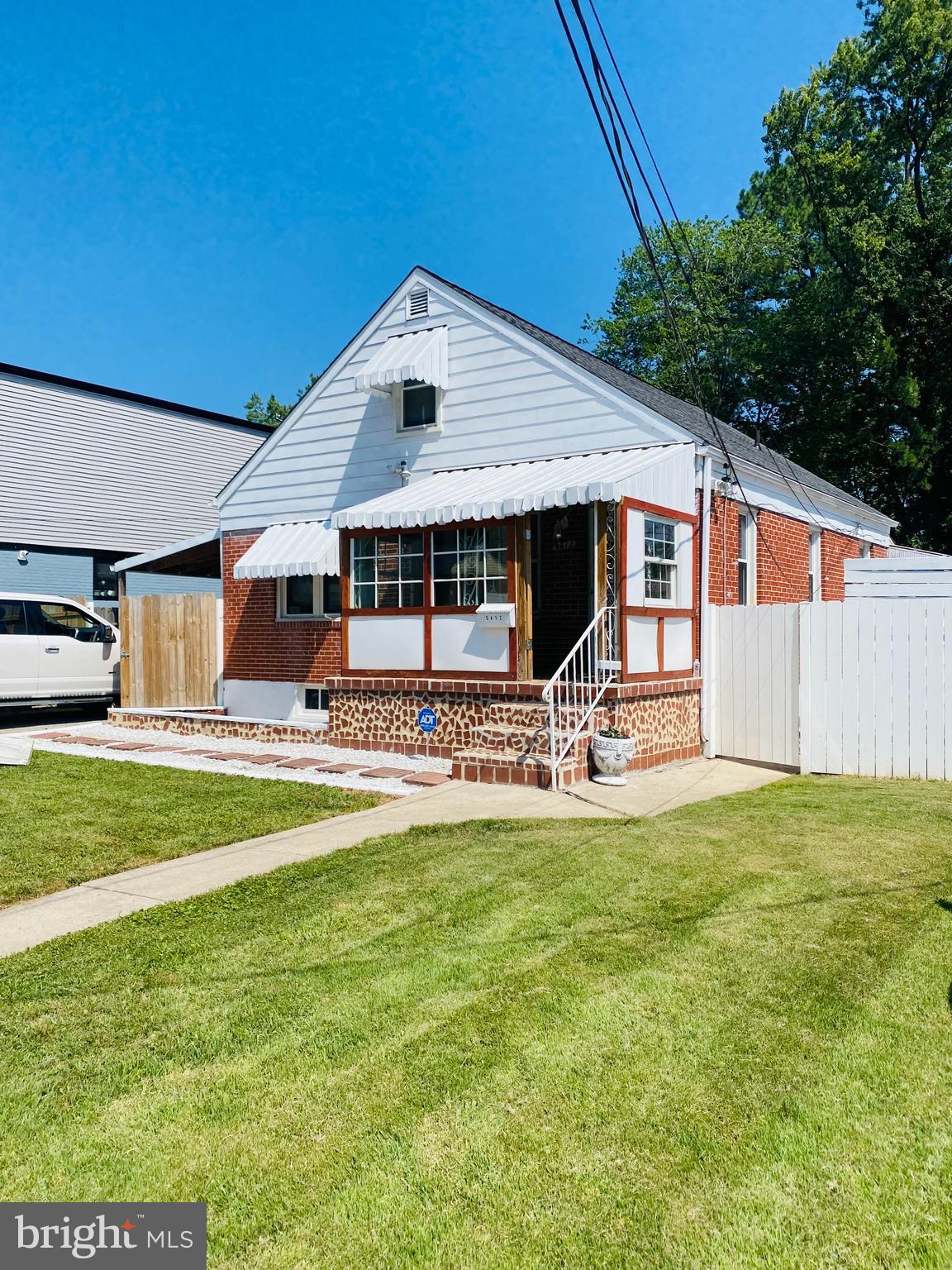 Charming Cape Cod with Endless Possibilities! Nestled on a generous 50x200 lot, this rarely available Cape Cod offers ample outdoor space for your creativity. Enjoy the covered carport, fenced rear yard, inviting rear and side patio areas, and much more. Step through the enclosed front porch into a spacious living room, perfect for entertaining or cozy evenings in. The main level features an eat-in kitchen, two comfortable bedrooms, and a full bath. Upstairs, you’ll find two additional bedrooms, offering plenty of space for family, guests, or a home office. The lower level is a highlight, boasting a large recreational/family room, a full bath, a half bath, a utility room, and a convenient rear entry to the back patio. Whether it's game night or a quiet retreat, this space has you covered. Recent upgrades add to the home's appeal: new electric service cable,, and a new washer and dryer. This property is a canvas, ready for you to make it your own while building equity. Being sold AS IS, but home inspections are welcome.