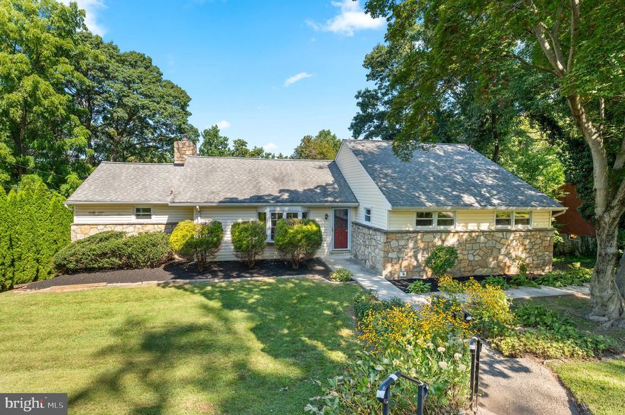 Welcome to 1140 Greentree Road in Penn Valley! This gorgeous one story, 3 bedroom, colonial raised ranch home is situated on a .52 acre lot, and it is one of the largest homes on the street.  And an added bonus: It also includes an expansive lower level.  This lower level is the perfect solution if you're seeking an au pair suite, in law suite, or whatever your needs may be.   As you enter the home through the front door, prepare to fall in love with the open flow and abundant natural light.  Step in the welcoming foyer.  Gleaming hardwood floors run throughout the main living area.  To the left is a formal dining area, with a built-in sideboard. Continue into the sunlit updated kitchen area, with vaulted ceilings, a peninsula, a cozy wood burning fireplace, and plenty of extra space off the kitchen for a large kitchen table and living area/playroom.  Continuing with the open floor of this expanded ranch, turn the corner to an enormous double living area with sliding glass doors to a new composite extra long deck overlooking the rear yard!  This deck is so grand, perfect for dining al fresco in the warmer months, or relaxing with your morning coffee.  The space in this home is perfect for everyday living, but is also an entertainer's delight!!  The main floor also has a large primary ensuite bedroom, with ample closet space.  The extra large ensuite neutral bathroom includes a large double vanity, a soaking tub, and an oversized shower.  The laundry closet is also tucked away in the primary bathroom.   The main floor boasts 2 additional bedrooms, and a full hall bathroom. In addition to this home's  convenient location, it is also in the top rated Lower Merion School District. This living room flows directly into a sunlit dining room drenched with natural light.  The updated and neutral ensuite marble bathroom includes an oversized shower.   Downstairs, enter the lower level which feels like a home of it's own complete with a kitchen, living space and 2 additional bedrooms and bathrooms!  There is also another laundry area in the lower level, and it has it's own private entrance from the driveway.  It is truly a "home within a home!"  All of the bedrooms, and the lower level have just been recently replaced in August with brand NEW carpet! The current owner has done extensive updates to prepare this property for the market including a new roof, new gutters, new flashing and 4 new sliding glass doors, to name a few!   This home has a private driveway, and one car attached garage. 1140 Greentree Road is in an ultra-convenient location, just a short drive to Narberth and minutes to Suburban Square, Trader Joe's, Whole Foods, and two different SEPTA stations, and minutes away from I-76, making it a commuter's dream! This home also features a Generac generator.  Make your appointment today!