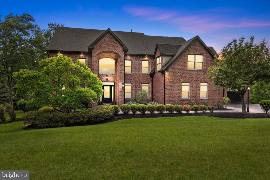 Renovated to the caliber of new construction, discover a rare opportunity where elegance meets endless possibilities.  Set on nearly 2.5 acre park-like acres beyond a secluded cul-de-sac, this timeless estate has been thoughtfully redesigned offering expansive spaces for gracious living and entertaining.
Warm, cohesive materials, wide-plank white oak flooring and sophisticated finishes create a seamless sense of luxury throughout. At the heart of the home, a spectacular chef's kitchen designed for both everyday living and grand-scale entertaining. Premium appliances include Sub-Zero refrigeration, Wolf cooking equipment, Cove dishwasher systems, advanced kitchen ventilation, custom cabinetry, and a dedicated coffee bar with a pullout refrigerator drawer. Stunning 3cm Calacatta Premata quartz countertops complement the expansive center island, providing ample space for seating, serving, and gathering. A remarkable walk-in pantry functions as a secondary prep kitchen, complete with custom cabinetry, refrigerator/freezer, icemaker, sink, and dishwasher. The adjoining sunroom is filled with natural light and features sliding glass doors leading to a spacious deck overlooking the serene, tree-lined backyard. A dramatic sunken family room serves as a welcoming gathering space, highlighted by a gas fireplace and an elegant wet bar featuring a Sub-Zero wine tower. Additional main-level spaces include a formal dining room, impressive two-story foyer, study or living room, and two well-appointed powder rooms. A versatile first-floor bonus room with a private exterior entrance offers endless possibilities as a guest bedroom, studio, home office, fitness room, or secondary living area. The second floor is equally impressive, featuring a dedicated guest suite, two additional bedrooms, and a spacious laundry room with custom cabinetry. The luxurious primary suite is designed as a personal retreat and includes a sophisticated custom closet with built-in storage and organization systems. A private staircase leads to an expansive finished attic, offering a rare opportunity to create additional living space tailored to your needs. The finished walkout basement boasts nearly 3,000 sq ft of space with multiple finished rooms ideal for recreation, fitness, media, office, along with abundant storage and an additional powder room. Further enhancing the property's versatility is a beautifully renovated one-bedroom apartment situated above the attached garage, complete with a brand-new kitchen, full bathroom with walk-in shower, and dedicated entrance—ideal for guests, extended family, an au pair suite, or home office. The home's extensive list of upgrades extends well beyond the surface. Modern conveniences include an irrigation system, Ring security system, hardwired smoke detectors, and a Control4 smart home audio system. Significant exterior improvements include new landscaping, new roof, gutters and driveway reseal. Extensive mechanical & efficiency upgrades include new heating systems, a new A/C compressor, programmable thermostats, a tankless water heater, and upgraded electronic controls for the water purification system. The property also offers exceptional garage and flex-space accommodations, featuring an oversized two-car attached garage and a separate one-car detached garage, both finished with durable epoxy flooring. Above the detached garage, there is a finished room left for your imagination. Reimagined from top to bottom, this is a rare opportunity to own a home that could not be replicated at this price point today.