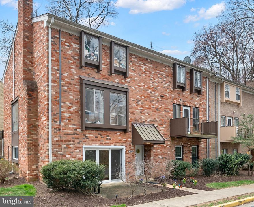 ***TRULY  MOVE IN CONDTION***Main level living in this all brick 2BR/2BA end unit with assigned space (#220 right next to unit)  completely renovated in last 5 years. Outdoor patio.  New paint. Living room/dining room combination features hardwoods and fireplace. Updated table-space kitchen  includes granite counter tops, stainless appliances, recessed lighting, subway tile backsplash, and huge pantry.
There is a large space perfect for  home office or exercise area with new LVP flooring. Spacious primary bedroom a has new LVP flooring and updated en-suite bath. Laundry features full size appliances 2019. HVAC 2019. Quiet community close to shopping and restaurants, downtown Fairfax, METRO, and Fairfax Hospital.