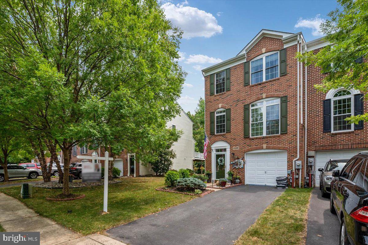 This end-unit townhome is full of charm, space and meticulously updated and maintained. You will love this kitchen, as it is perfect for entertaining with the white cabinets, granite countertops, large island for easy family dinners, 6-burner Viking gas cooktop, all stainless steel appliances, with the eat-in kitchen with a view of the gorgeous backyard! These owners have made upgrades galore, including shiplap walls, new hardwood rustic floors; there's absolutely nothing to do but make a great offer and move in! Wait until you see all the landscaping and the tranquil backyard that you can enjoy from the paver's patio or overlook it on your composite deck. These sellers didn't need to do a thing to get this home on the market, it was picture perfect already!