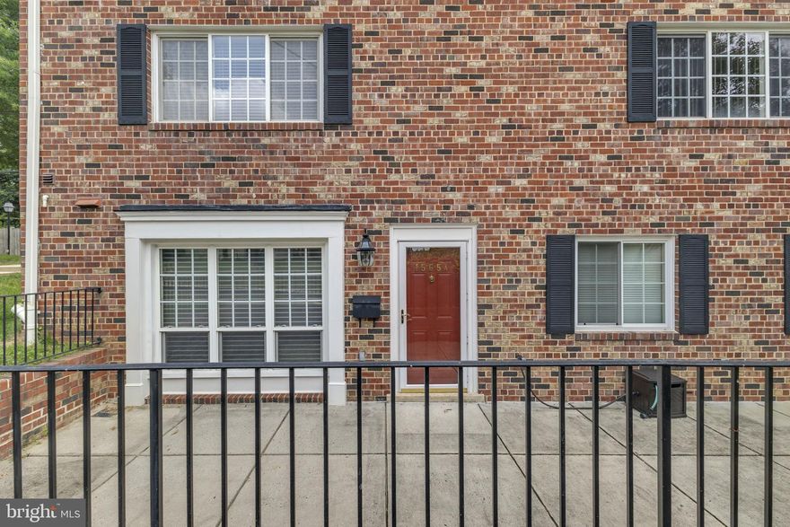 Discover this rarely available ground-floor, single-level brick condo with 1,279 sq ft of comfortable living space. Featuring continuous wood flooring and oversized windows with serene courtyard views, the open living-dining area flows seamlessly into the updated kitchen. Ample storage includes a pantry, coat closet, and in-unit laundry room.
Relax or entertain outdoors in your private oversized patio overlooking green space. Enjoy access to resort-style amenities including a clubhouse, fitness center, pool, and electric car charging stations. Convenient Metrobussing near the Mark Center with a 15-minute commute to Pentagon City. With easy access to major routes and shopping, this home offers both comfort and convenience.