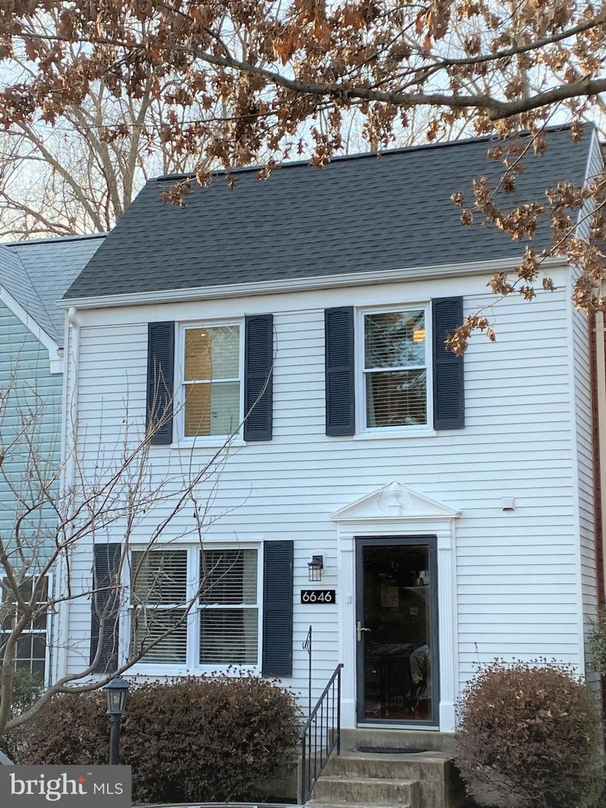 Welcome Home!  This lovely 2-bedroom, 2.5 bath townhome is nestled in the Amberleigh community, backing up to woods.   Walk in the front door and you are  greeted by nice size living area with wood floors.  find a coat closet and fully updated powder room tucked away by the front door. Move into the updated kitchen that features granite countertops, a large peninsula with storage, and stainless steel appliances. The microwave and stove both have convection oven.  The sliding glass door opens to large deck which faces the woods.  Look UP to see the unique and fabulous light fixtures in every room.   Upstairs you will find 2 en-suite bedrooms.  The primary bedroom features an upgraded bathroom with high-end finishes, an oversized soaking tub, stand-alone shower with beautiful marble tiles and double sink vanity.  The 2nd bedroom also features a wonderful, fully upgraded bathroom with a large, tiled walk-in shower.    The large family room in the basement has a fireplace, sliding doors leading to an outside second deck, part of which is covered by the awesome deck from above (yes, a double deck).   The basement Laundry room has ample storage and is pre-plumbed to add a bathroom.  Additional storage can be found under the basement stairs and in the attic, accessible by the pull-down ladder on the top floor.    The home features a brand new roof and skylight, installed 2/17/2021 with a transferable warranty, along with low-maintenance Gutter Helmet gutter guards.  HVAC was replaced in 2019.   Close to a well-lit walking trail accessible to the Franconia-Springfield Metro, short drive to shopping, entertainment, I95, I395 and I495, Wegmans, Springfield mall, Fort Belvoir and so much more.  The Amberleigh community features multiple tot lots, basketball and tennis courts,  a dog park, and has multiple walking trails through wooded areas for fun adventures