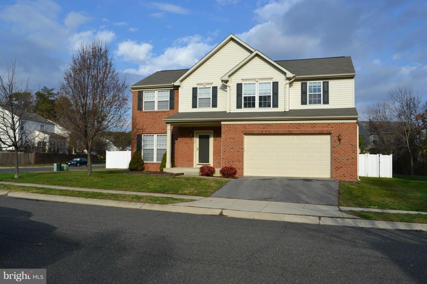 Spacious Colonial Home with 2 Car Garage.  Wood Floors on Main Level. Open Kitchen with Breakfast Area  with Family Room Adjacent with Gas Fireplace. Kitchen with Granite, 42 Inch Cabinets, Stainless Steel, & Pantry.  Huge Second Floor Family/Bonus Room.  Large Master Bedroom with Master Bath, Soaking Tub, Double Sinks, & Walk In Closet.  Unfinished Basement with Bath Rough In. Fenced Backyard.