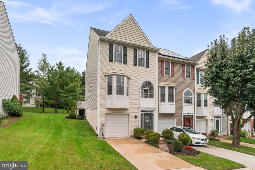 This beautiful end-of-group townhome with garage offers modern updates, abundant natural light, and an open, contemporary floor plan—making it completely move-in ready!

Step inside the sun-filled two-story foyer and feel right at home. The entry level provides a spacious family room with a cozy pellet stove, crown molding, and soft carpeting—an ideal space for movie nights or relaxing with friends. You’ll also find the laundry/utility room and access to the garage on this level.

Upstairs, the open-concept main living area is perfect for entertaining. The combined living and dining rooms feature a lovely bay window, while the updated eat-in kitchen shines with granite countertops, stainless steel appliances, a pantry, and modern lighting. A sliding door off the kitchen leads to a large deck—rebuilt in 2022 with all new boards, steps, and gate—offering the perfect spot for grilling, dining, or soaking up the sun.

The upper level includes a spacious primary suite with a vaulted ceiling, a walk-in closet, and a beautifully updated ensuite bath. Two additional bedrooms—each with vaulted ceilings, ceiling fans, and generous closets—share a full hall bath and a convenient linen closet.

This home has been thoughtfully maintained and enhanced with major updates, including a full roof replacement (2017, still under 10-year warranty), expanded kitchen pantry and refreshed cabinetry, flooring, and lighting (2019), replacement of the water heater expansion tank (2021), brand-new carpet upstairs (2025), and a new HVAC system (2025) with 10-year warranty—offering peace of mind for years to come.

Located in the Patapsco Falls North neighborhood in Catonsville, you’ll love being a short drive from village shops, restaurants, music venues, farmers’ markets, festivals, and the beloved 4th of July celebrations. With the nearby Trolley Trail and Patapsco State Park, hiking and biking can easily become part of your everyday routine.

There’s just so much to love about this light-filled home and its vibrant community—come see why life in Catonsville truly shines!