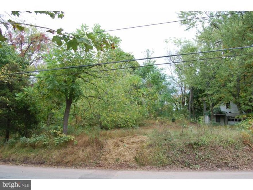 Picturesque 1.88 Building lot in desirable Springford SD. The perfect spot to build your dream home with privacy and views of farmland!  Rural setting, but just 2 minutes from Philadelphia Premium Outlets, Restaurants and Entertainment. Less 10 minutes from Providence Town Center in Collegeville! Semi cleared, semi wooded, public sewer available at street. Well on property. Garage/building on property. Buyer responsible for sewer hook up.