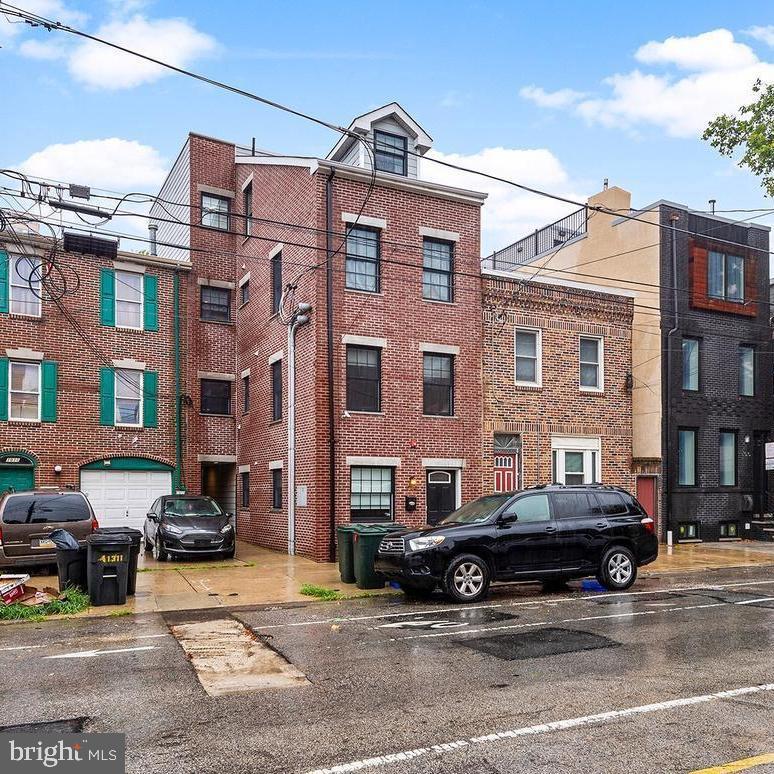 1014 E Moyamensing is a fully occupied, newer construction, 5 unit apartment building in highly desired Queen Village neighborhood, located on a tree-lined residential street within a short walk or ride to Giant Heirloom for groceries, Target for home essentials, and two of Philly's best restaurants to satisfy essential cravings for cheesesteaks and sushi - at Angelo's and Royal Sushi & Izakaya. The building is made up of one 1-Bedroom unit, and four 2-Bedroom units. Each unit was thoughtfully built to optimize for modern living, offering contemporary design, with both light and dark color palettes, wine storage, hardwood flooring throughout, spacious closets, and outdoor space, some units offering a private backyard or balcony, while others have access to two separate, spacious roof deck spaces. Each unit further has separate utilities meters and tax IDs, permitting future sales of individual condo units, offering ownership a stellar performing asset with several incredible opportunities. The property is currently managed professionally and easy to rent.