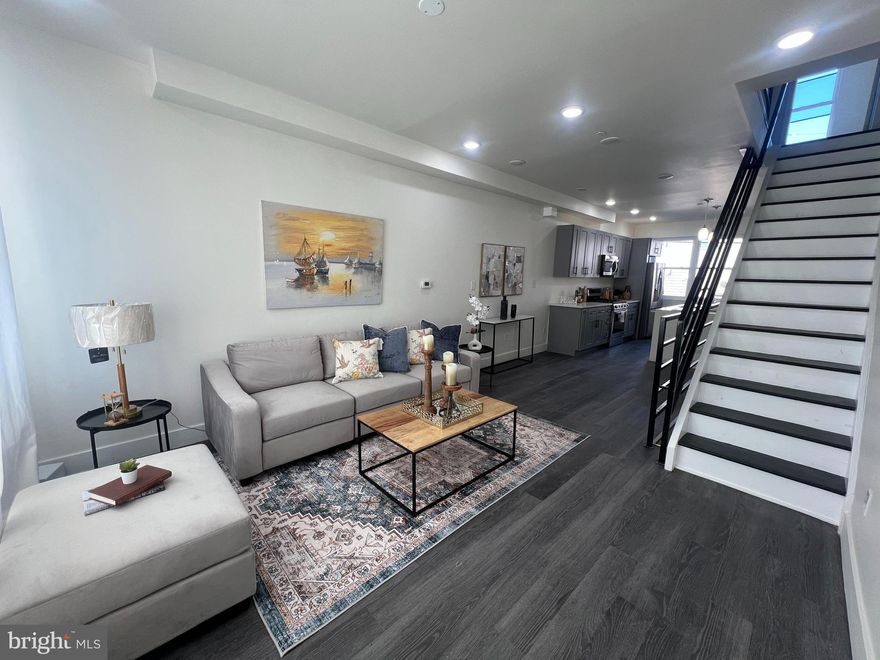 Experience elevated urban living at 2407 W Seybert Street, a sleek and sophisticated new-construction townhouse in vibrant Brewerytown. Boasting over 2,200 sq ft of impeccably designed space, this 3-bedroom, 3-bath residence offers refined finishes throughout—from rich hardwood flooring and soaring ceilings to a chef’s kitchen adorned with quartz countertops, custom cabinetry, and premium stainless steel appliances. The expansive primary suite features a spa-inspired bath, walk-in closet, and access to a private rooftop deck with breathtaking Center City skyline views. A fully finished lower level provides versatile space for a media lounge, home gym, or office. With a 10-year tax abatement, and a prime location near world-class museums, dining, and transit, this is city living at its most luxurious.