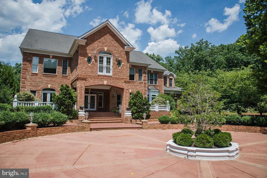 The perfect home resort* extensive grounds w/in ground pool, hot tub, grill area, tennis, basketball & beach volleyball courts. Unique & sophisticated floor plan. Gourmet kitchen w/ stainless steel appliances, maple cabinets & granite counters.Fantastic Master Suite w/ dream walk-in closet, wet bar and sumptuous bath- Awesome lower level w/ gym & media room.Detached studio w/ full bath & garage.