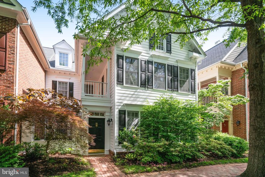 Rarely available two-level Charleston-inspired townhouse in the highly coveted Old Town Village in Old Town Alexandria. The welcoming entrance opens into a charming private courtyard with a tranquil water feature—perfect for relaxing or entertaining. The main level is thoughtfully designed for everyday living and hosting, featuring a spacious living room, two gas fireplaces, elegant dining area, spacious kitchen, convenient laundry room, and a powder room. Upstairs, you'll find two generously sized bedrooms with a full bath and a private, spacious primary suite with access to the upper deck, a sitting area, large walk-in closet and spa bath with dual sinks, a soaking tub and separate shower.  A two-car garage at the rear of the home provides both convenience and privacy. Old Town Village offers exceptional amenities including a clubhouse, saltwater pool, bike path, picnic area, and tot lot.  New roof installed in 2024. Ideally located near everything Old Town has to offer—Metro, charming coffee shops, boutique shopping, renowned restaurants, and scenic waterfront strolls. Experience the best of Old Town living in this rarely available home.